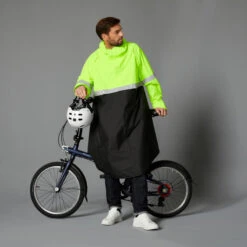 BTWIN PONCHO PLUIE VISIBILITE JOUR NUIT 560 NOIR JAUNE FLUO -Cycle Libre Magasin poncho pluie visibilite jour nuit 560 noir jaune fluo 3